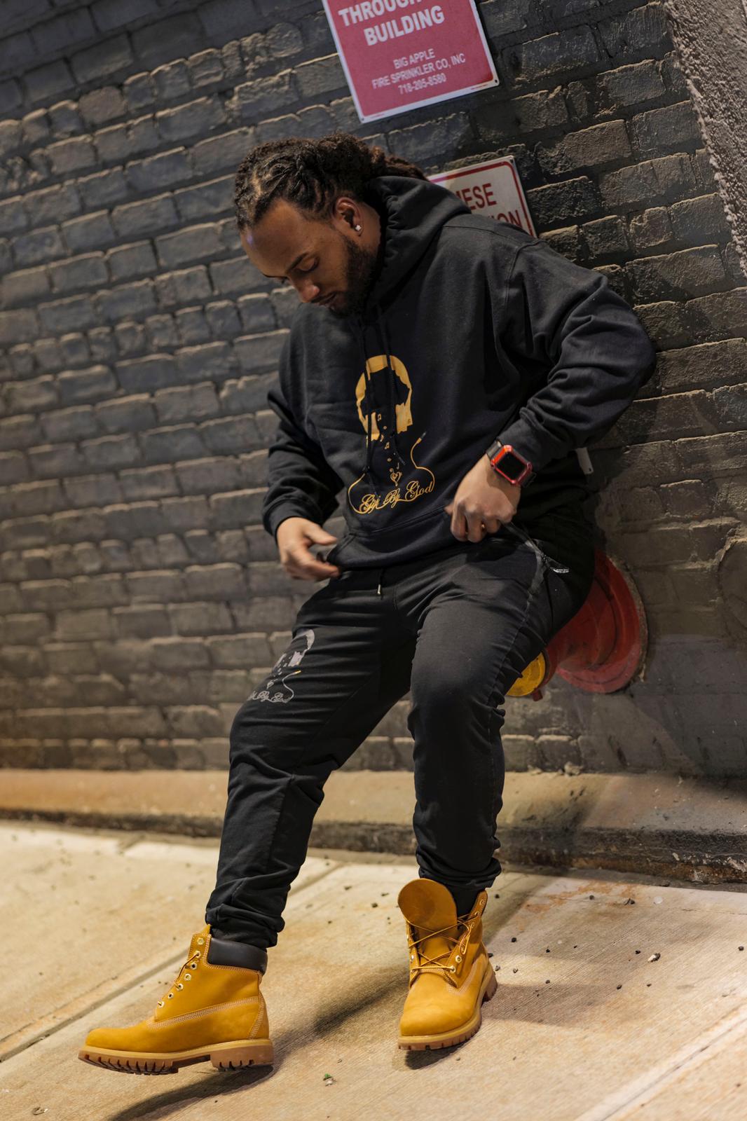 Black with gold logo at the front